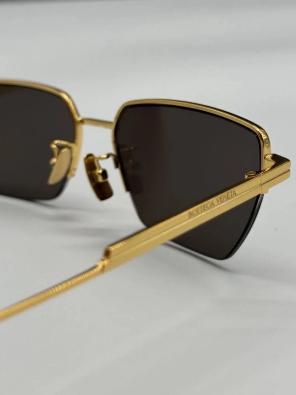 Bottega Veneta Gold Frame Sunglasses with Dark Brown Lenses